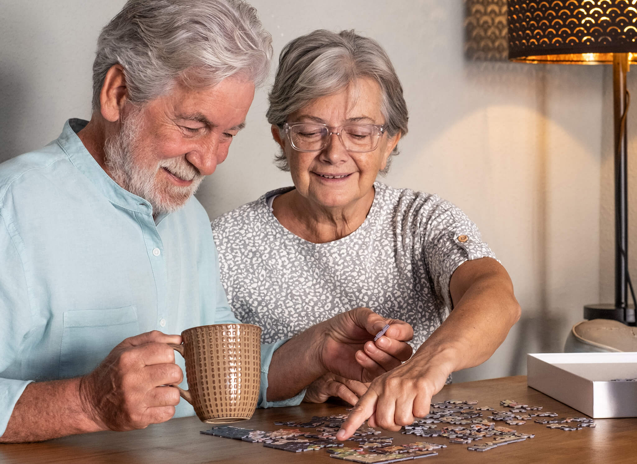 residents putting together a puzzle